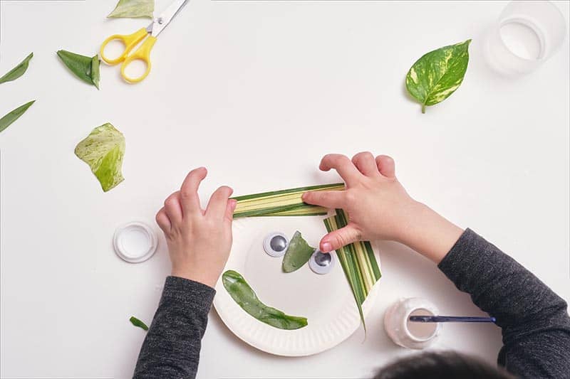 image of a kid's hands making art